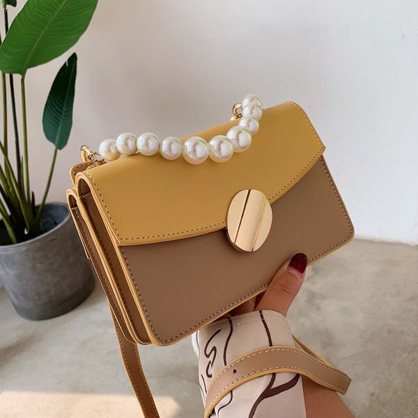 

new korean version of textured pearl handbag joker shoulder slung double-sided small square bag hand bag