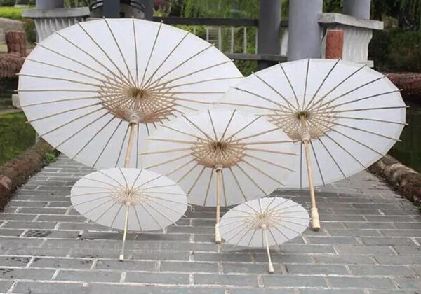 

2018 bridal wedding parasols white paper umbrellas chinese mini craft umbrella 4 diameter:20,30,40,60cm wedding umbrellas for wholesale