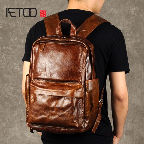 

aetoo retro oil wax backpack male leather bag trend of baotou leisure computer layer of leather backpack