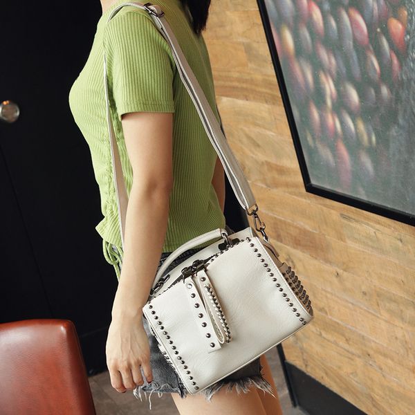 

rivet bag female 2020 new wave soft leather shoulder korean pillow handbag wild messenger small bag crossbody bags for women