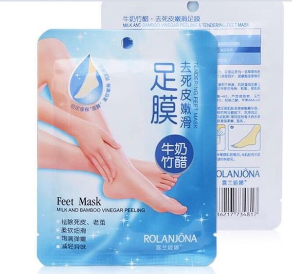 2pcs = 1pair Piedi di cura della mascherina Esfoliante Peel della mascherina del piede del bambino piedi morbidi Rimuovere Scrub callo duro Piedi morte della pelle Maschera