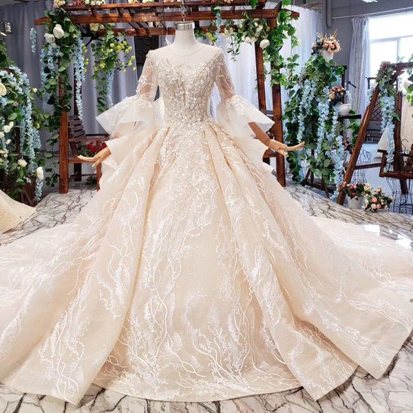 

2019 latest lace wedding dress illusion o neck open keyhole back horn 3/4 sleeve cascading ruffle long train simple wedding dresses garden, White