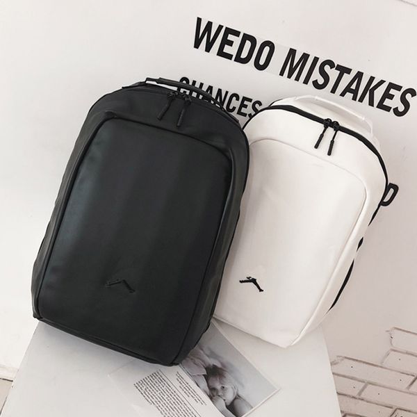 

2019 Men and women new outdoor backpack Fashion A backpack Personality J bag leather simple solid black and white backpack