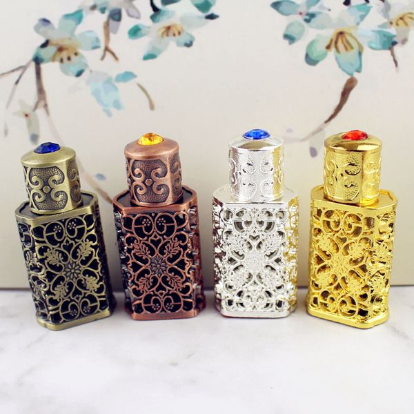 

3ml antiqued metal perfume bottle arab style alloy hollow out essential oils bottle middle east glass dropper bottle