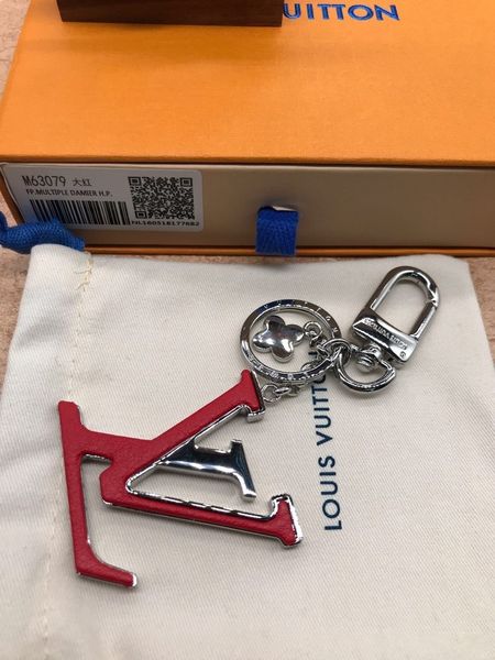 

Дамы мода бутик ювелирные изделия сумка и брелок. Алфавитные элементы, материалы