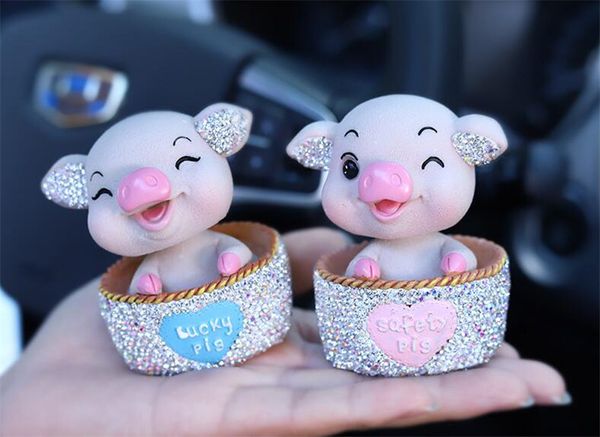 

car decoration spring cartoon doll resin rhinestone shaking head pig lucky cat car interior decoration pink blue