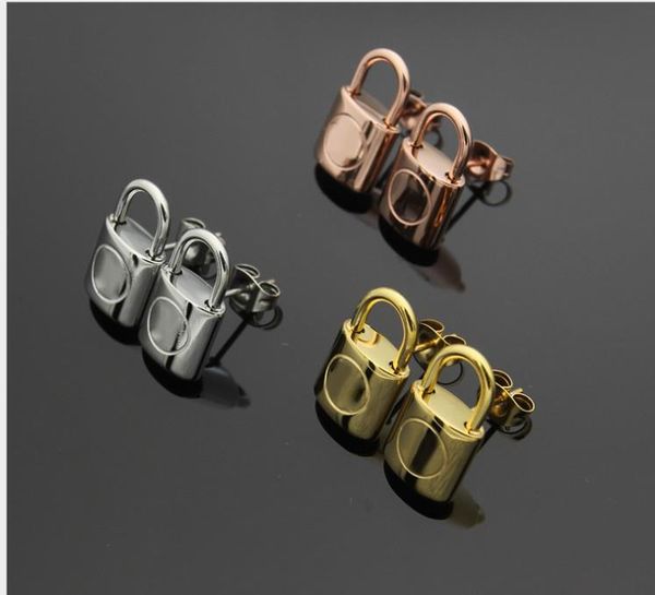 

titanium steel lock head earrings 18k gold male and female earrings, Golden;silver