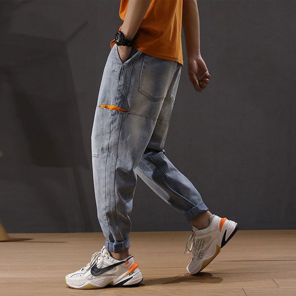 

fashion streetwear men jeans light blue loose fit multi pockets harem pants spliced designer hip hop jeans men pencil pants