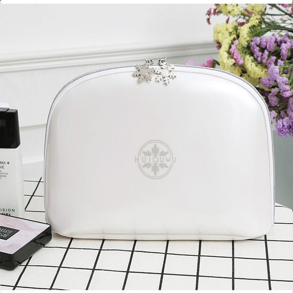 

multi functional black and white make-up bag to store the middle bag