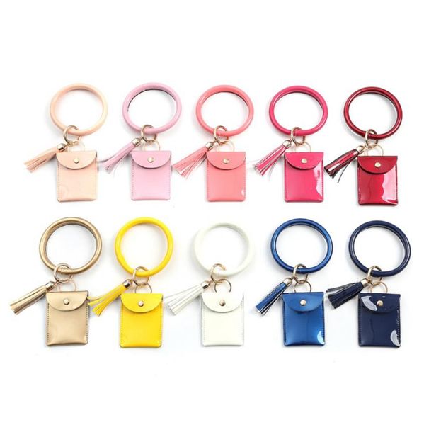 Braccialetto Portachiavi Borse per carte PU Cinturino in pelle Borsa per monete Bracciale con nappa Borse per portafoglio Gioielli per ragazze 10 Disegni DW5415