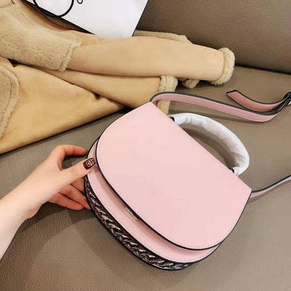 

new fashion joker semicircle on the saddle bag one shoulder his portable leather flip lock chain small lady handbag a designer shoulder bag