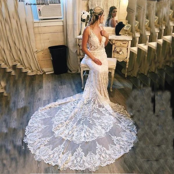 

ретро полное кружевное свадебные платья русалки глубокие v-образные вырезывающие поезда поезда из спины элегантные свадебные платья невесты, White