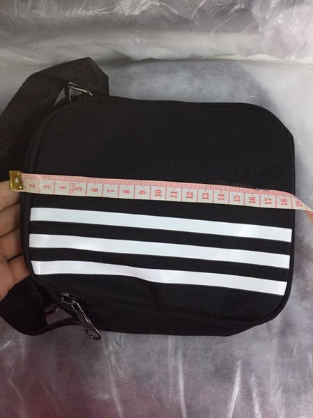

De igner cro body bag with letter tripe printed me enger bag men houlder luxury cro body bag zipper for women