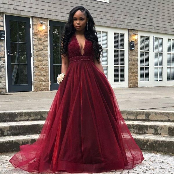 

Modern Burgundy A Line Prom Dresses Deep V Neck Beading Backless Tulle Formal Gown Tiered Skirt Tulle Girls Party Dress