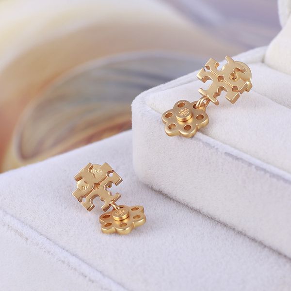 

Горячие продажи Женщины падение очарование серьги с полым цветка серег партии сп