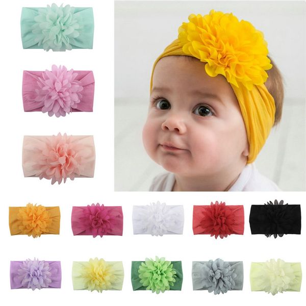 Cute Kids Girl Baby Solid Soft Nylon Confortevole Moda Casual Fasce per capelli Accessori per fascia per capelli con fiocco di fiori appena nati