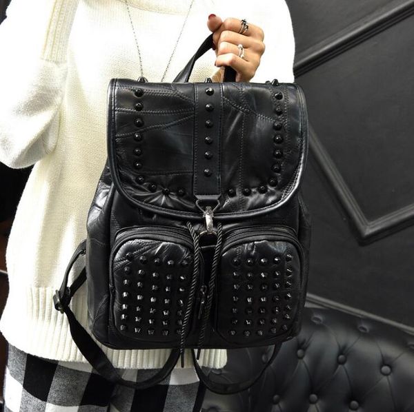 

designer- pure black genuine sheepskin leather women shoulders backpack rivet element fashion backpack school bags tide trend designer bag