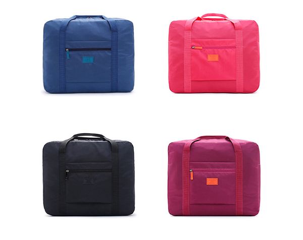 

new fashion travel pouch waterproof travel handbags women luggage travel folding bags 4 colours ship