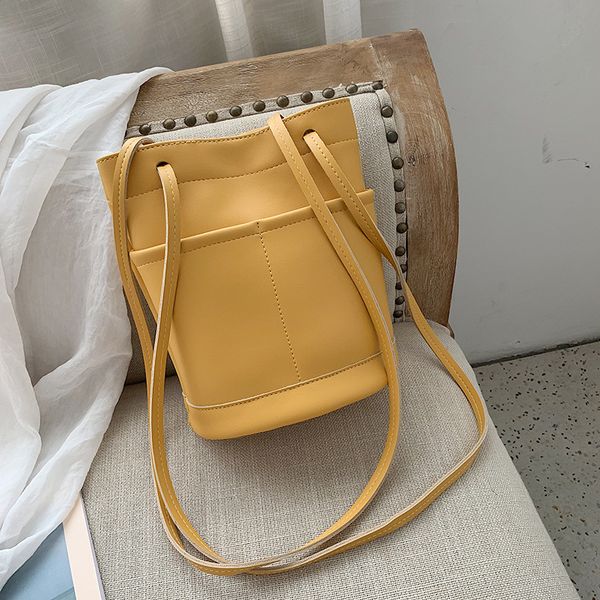 

baggage girl 2019 new simple retro bucket bag ins fashion lady one shoulder slant bag