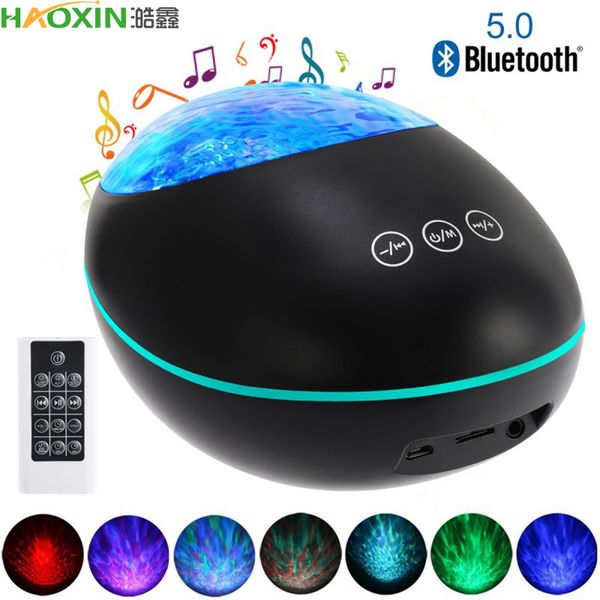 

haoxin night light projector with music player bluetooth 5.0 lucky stone ocean wave projector 12 led 8 colors remote controled