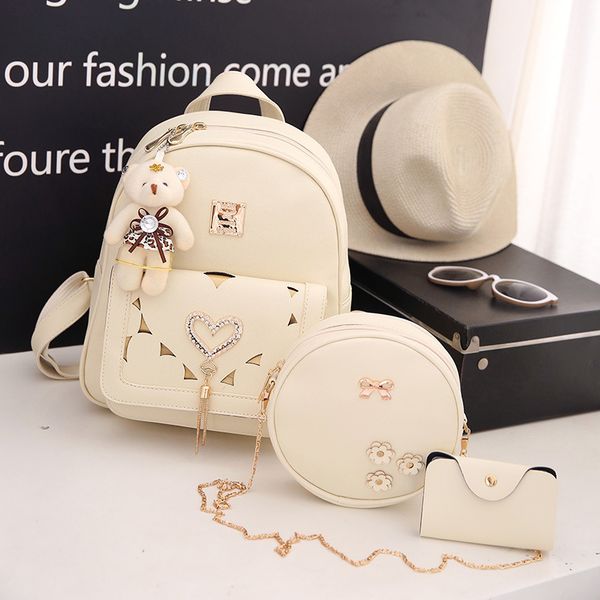 

2020 new style backpack fashion pu three-piece women's bag girl's cute hollow backpack college style student bag