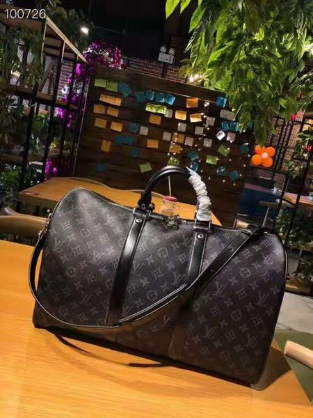 

Cla ic de igner double houlder bag very fa hion travel bag patent canva luxury duffle luggage bag black handbag m41418