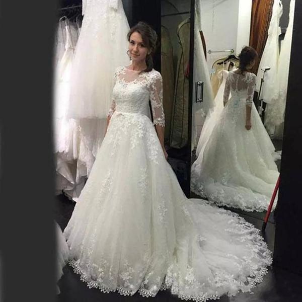 

Elegant Bridal Gowns Jewel Sheer Neck Half Sleeves Wedding Gowns With Lace Applique A-Line Tiered Ruffle Sweep Train Custom Made Gowns