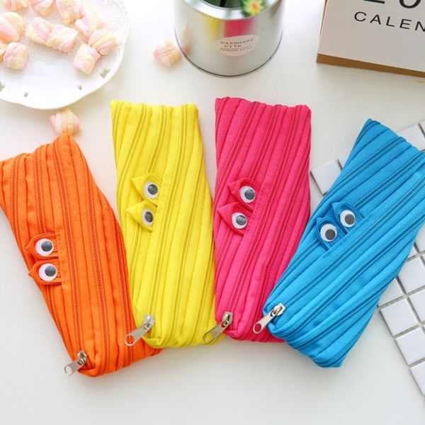 

2019 new creative multifunctional simple cute large capacity small monster storage pen bag change bag glasses bag school supplies multicolor