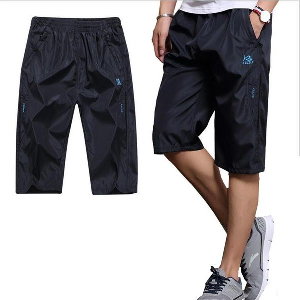 

летние мужские шорты с карманами на молнии бодибилдинг одежда сплошной цвет спортивные быстросохнущие короткие мужские свободные шорты рабоч, White;black