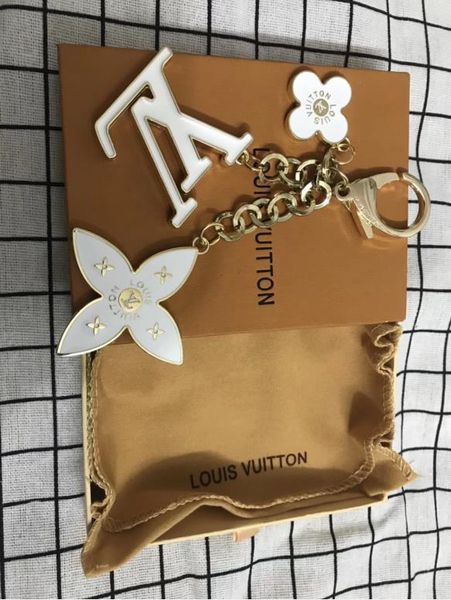 

louis vuitton keychain дизайнер мужчины и женщины брелок новый высокое качество роскошный брелок дизайнер сумочка кулон сумка мода бесплатна, Silver