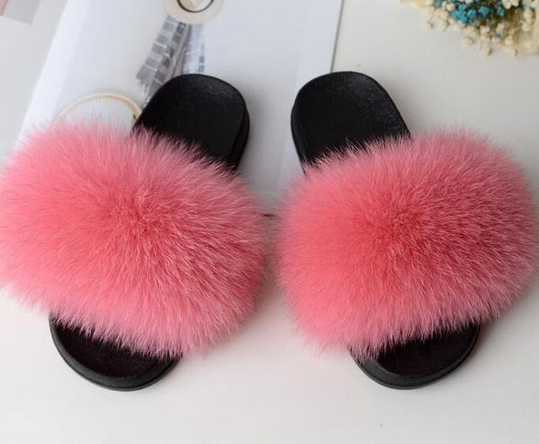 pink flip flops with fur