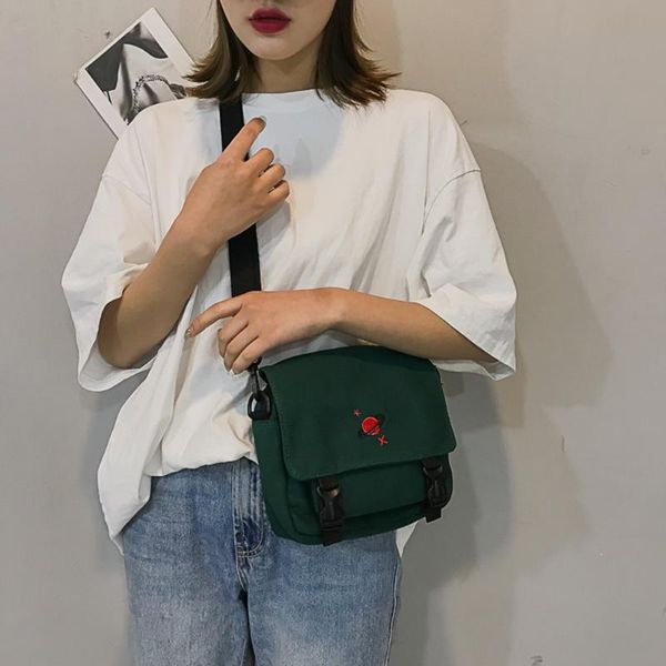 

2019 new women's embroidered canvas handbag buckle creative cartoon shoulder bag