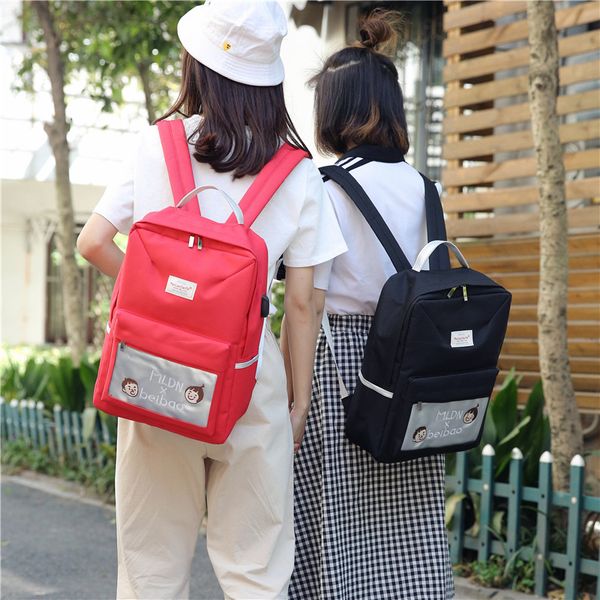 

cute character printed backpack women solid color canvas school bag for teenage girl big capcity bookbag casual travel bags 2019