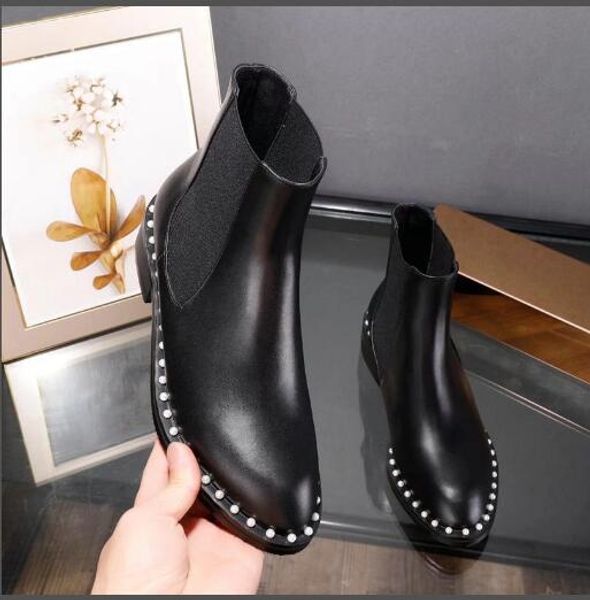 

Новые заклепки короткие сапоги для женщин плоское дно овчины скольжения на мотоц