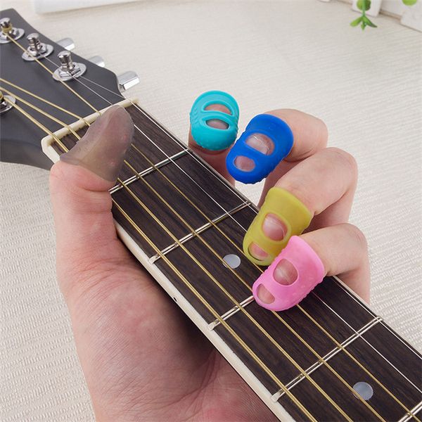 Silicone guitarra dedo manga dedo polegar pega protetores de dedos de guitarra útil para o Iniciante da guitarra acústica Outros strings Instrument DHL