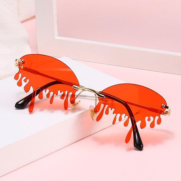 

2020 fashion tears flame sunglasses women men brand design rimless wave eyewear luxury trending narrow sun glasses streetwear xtcaa