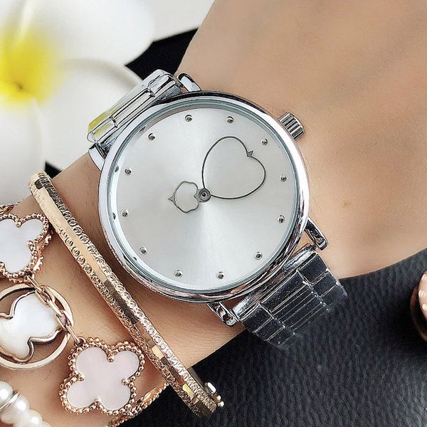 Il marchio di moda guarda l'orologio da polso al quarzo T145 con cinturino in acciaio con cinturino in metallo stile puntatore cuore da donna