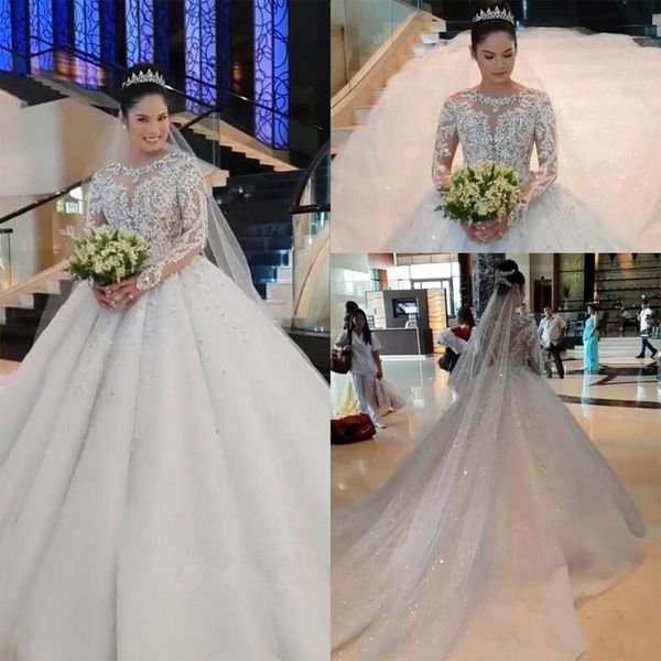 

sparkly long sleeves ball gown wedding dresses puffy bling bling long slong sleeve sheer jewel neck appliques sequins beads bridal gowns, White