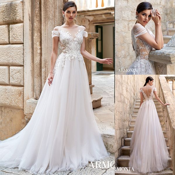 

modest bohemian tmarmonia a line wedding dresses jewel neck short sleeve tulle lace applique pearls wedding gowns sweep train robe de mariÃ©e, White