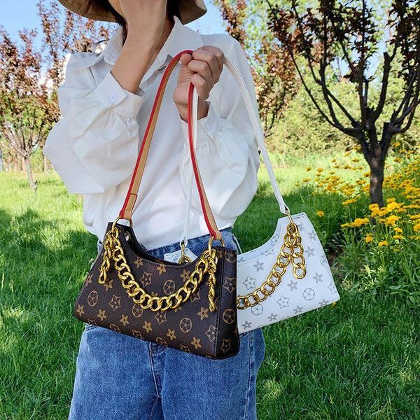 

2020 new presbyopia armpit bag official thick chain bag retro portable niche baguette net red small ck handbag