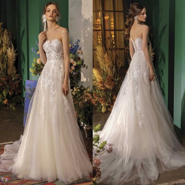 

sparkly lace appliqued wedding dresses sheer bateau neck beaded bridal gowns a line covered buttons back sweep train tulle robe de mariÃ©e, White