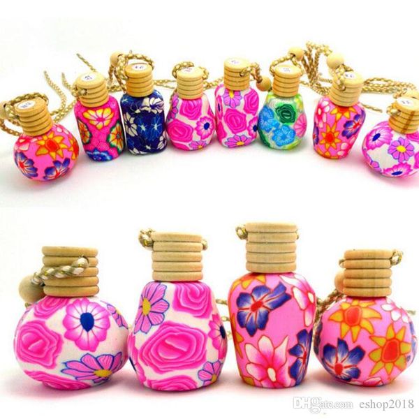 

New arrive car hang decoration ceramic e ence oil perfume bottle hang rope empty bottle hipping