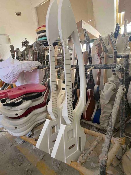 

custom made in china c special irregular electric guitar in white