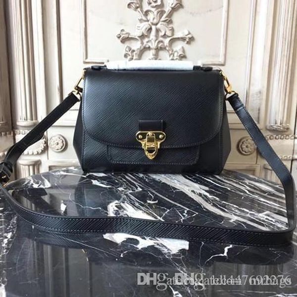

ladies handbag. designer shoulder diagonal package. covered design. metal lock closure switch. detachable leather shoulder strap