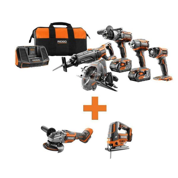 

New ridgid 18v cordle combo tool kit 7 tool drill impact aw grinder light et