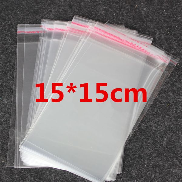 500 pz 15 * 15 cm Trasparente Trasparente Autoadesivo Richiudibile Opp Cibo Caramelle Biscotto Gioielli Sacchetti Regalo Carta di Imballaggio Calzino Sacchetto di Plastica