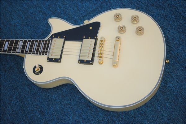 

6-string electric guitar with cream yellow color,gold hardware,rosewood fingerboard,can be customized