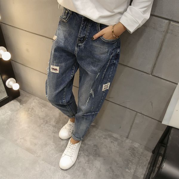 

light blue loose big yards jeans female hole fat mm han edition joker harlan show thin new bf torre pants