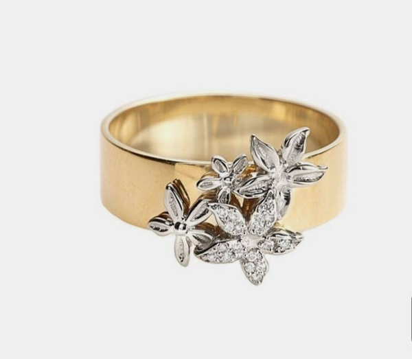 

custom 10k yellow gold and white gold flower moissanite ring, Silver