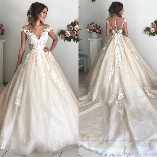 

Light champagne lace applique a line wedding dre e luxury off houlder heer button back weep train bohemian bridal gown